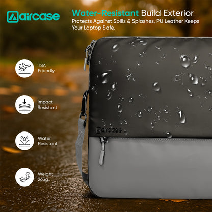AirCase 13.3-inch laptop sleeve with shockproof foam, water-resistant PU leather, front pocket, luggage belt, and premium zipper